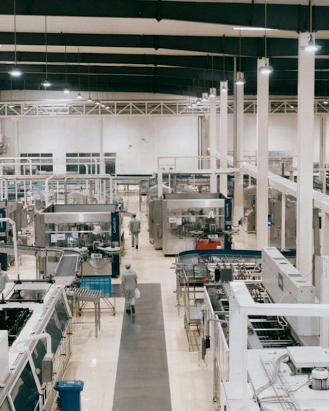 Machinery and production lines inside a manufacturing facility